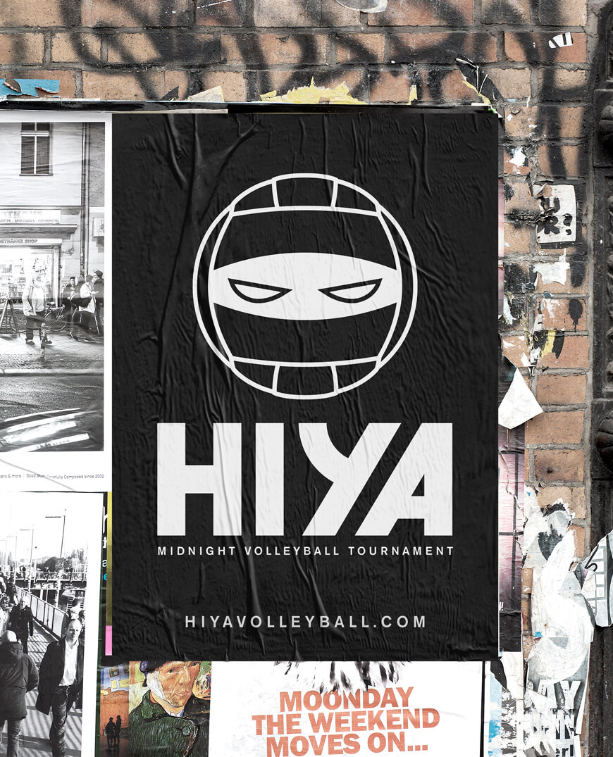 Black wheatpaste poster with icon of volleyball combined with ninja eyes and HIYA text underneath